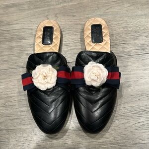 Black Gucci loafers